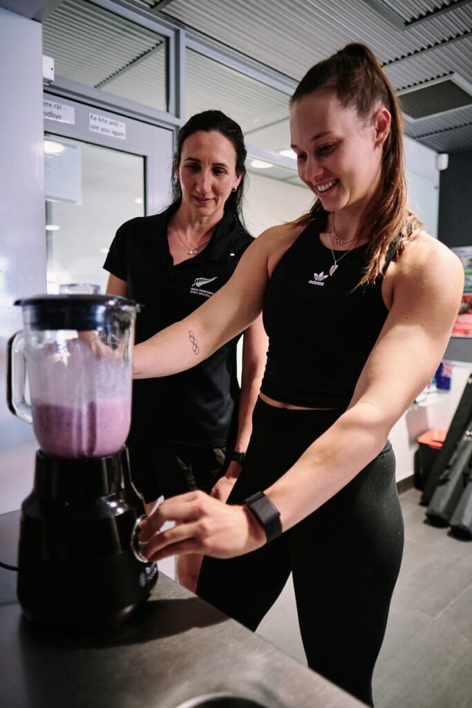 Nutritionist Katie Schofield in the kitchen with pole vaulter Olivia McTaggart