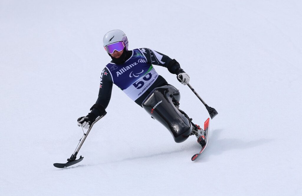 CORTINA D'AMPEZZO, ITALY - MARCH 09: Corey Peters of Team New Zealand competes during the Men's Alpine Skiing Super-G Standing on day three of the Milano Cortina 2026 Winter Paralympic Games at Tofane Alpine Skiing Centre on March 09, 2026 in Cortina d'Ampezzo, Italy. (Photo by Maja Hitij/Getty Images)