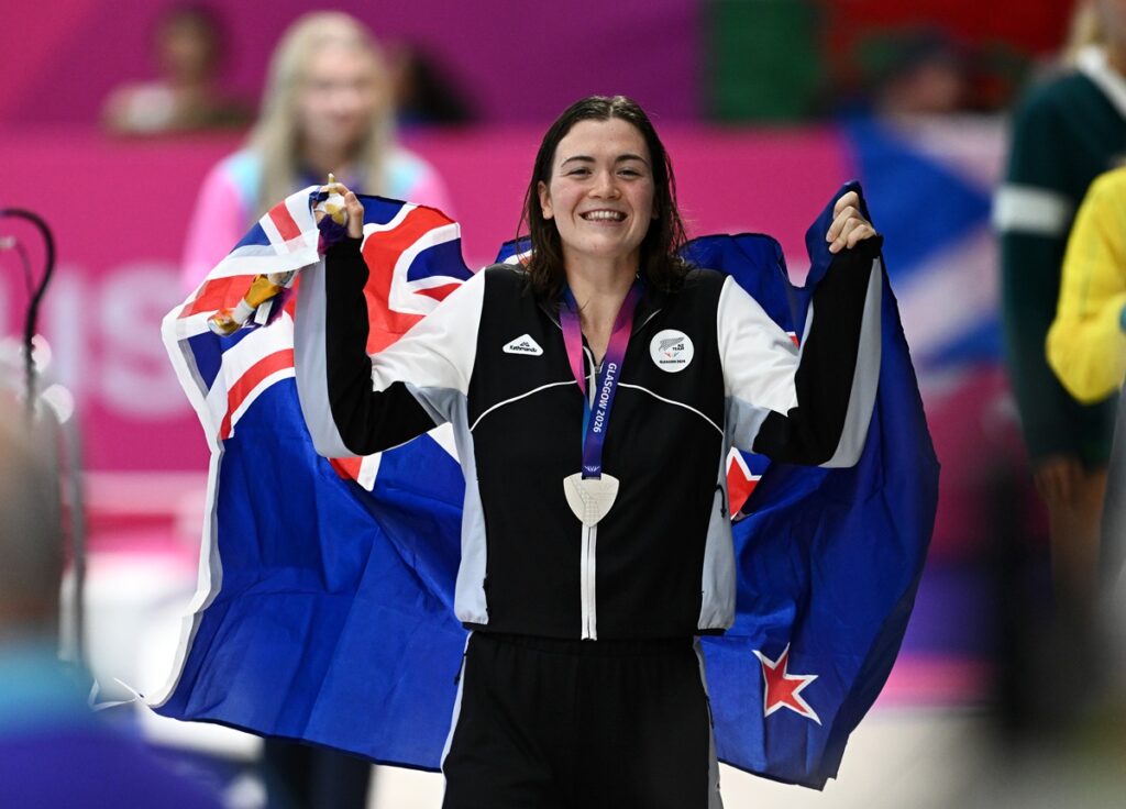 GLASGOW, SCOTLAND - JULY 28: Silver medalist Erika Fairweather of Team New Zealand celebrates after the Women's 800m Freestyle Medal Ceremony on day five of the Glasgow 2026 Commonwealth Games at Tollcross International Swimming Centre on July 28, 2026 in Glasgow, Scotland. (Photo by Quinn Rooney/Getty Images)